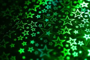 緑色に光る星型パターンのホログラフィック画像